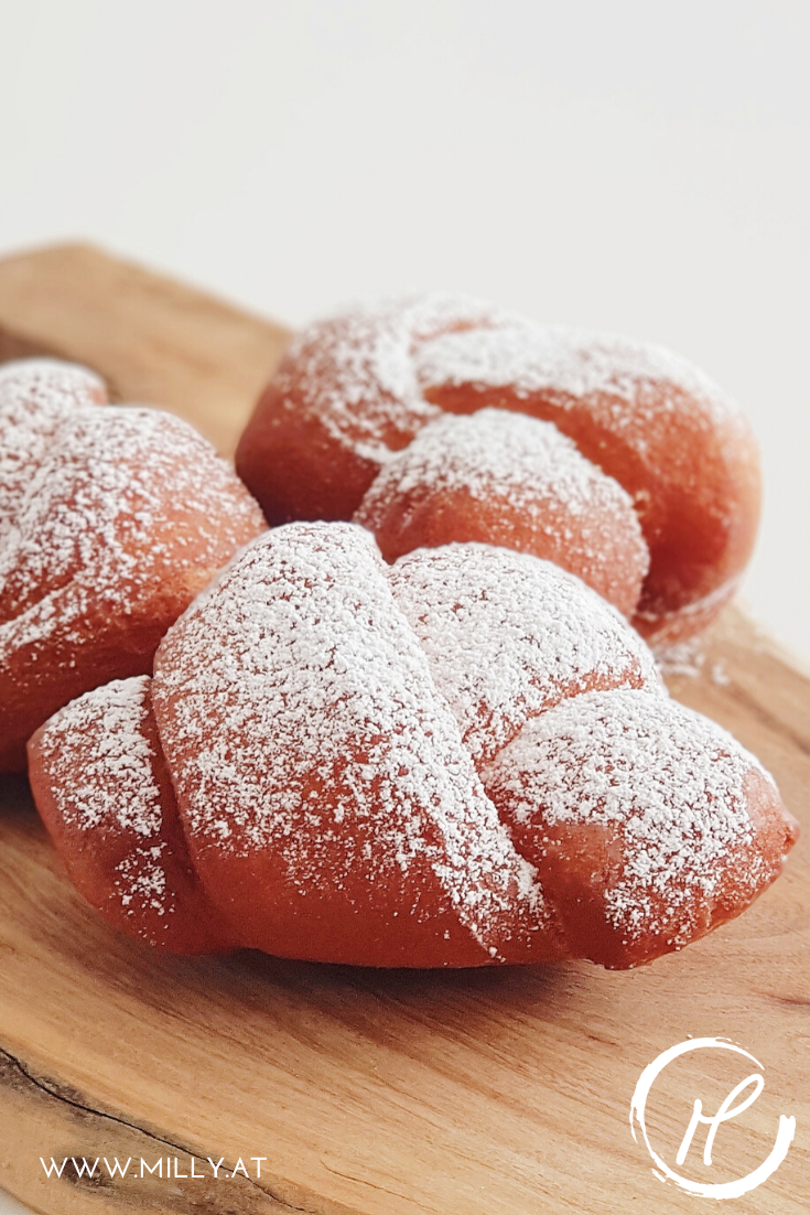 "Verwurelter" litteraly translated means "the messy/untidy ones". They are little knots, traditionally made of the left-over dough, and deep-fried.