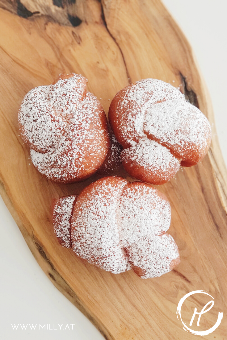 "Verwurelter" litteraly translated means "the messy/untidy ones". They are little knots, traditionally made of the left-over dough, and deep-fried.