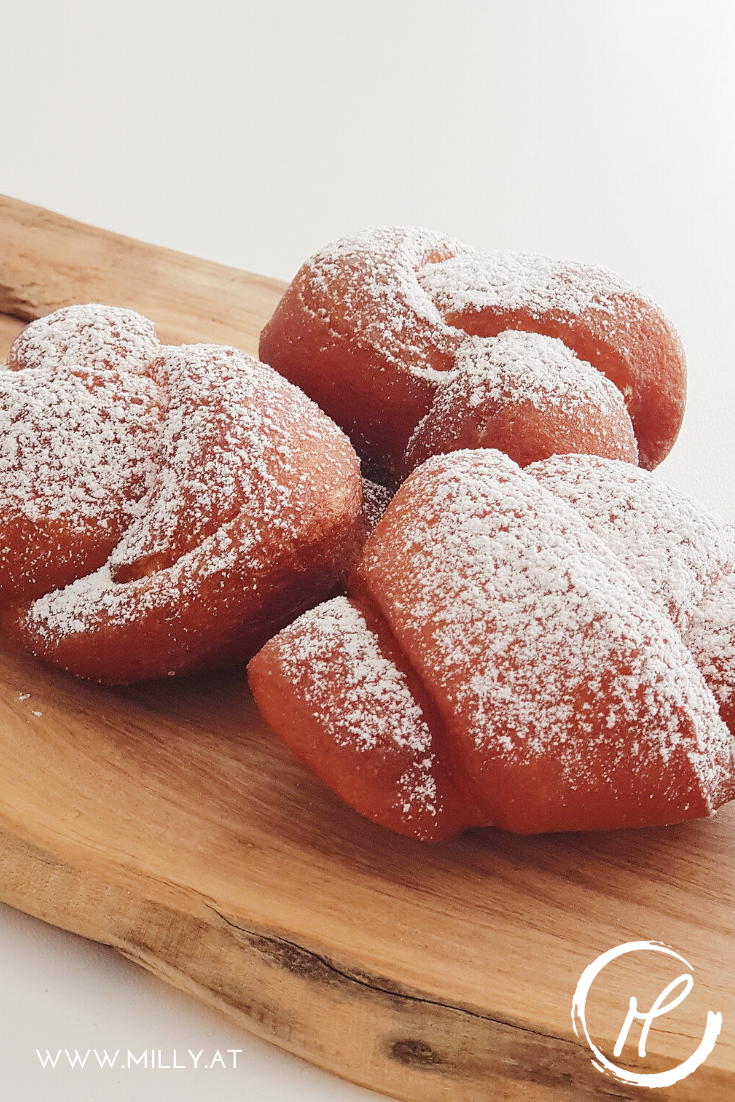 "Verwurelter" litteraly translated means "the messy/untidy ones". They are little knots, traditionally made of the left-over dough, and deep-fried.