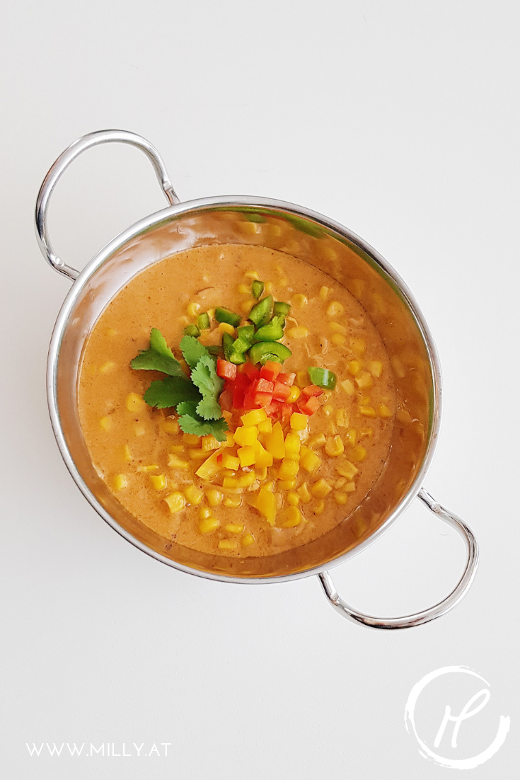 This indian corn curry in coconut milk is sweat and savory and will make every vegetarian's (or other) heart beat faster! #curry #corn